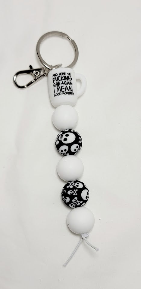 "And here we f*cking go again" bar keychain - 2 Options