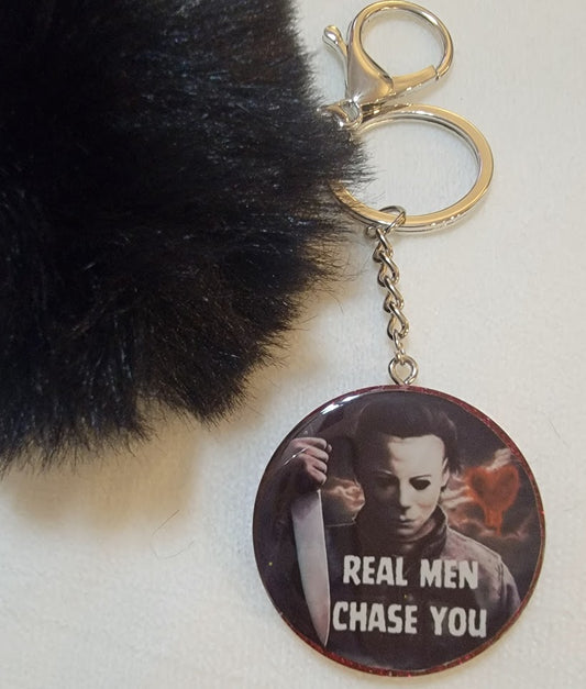 "Real Men Chase You" Keychain