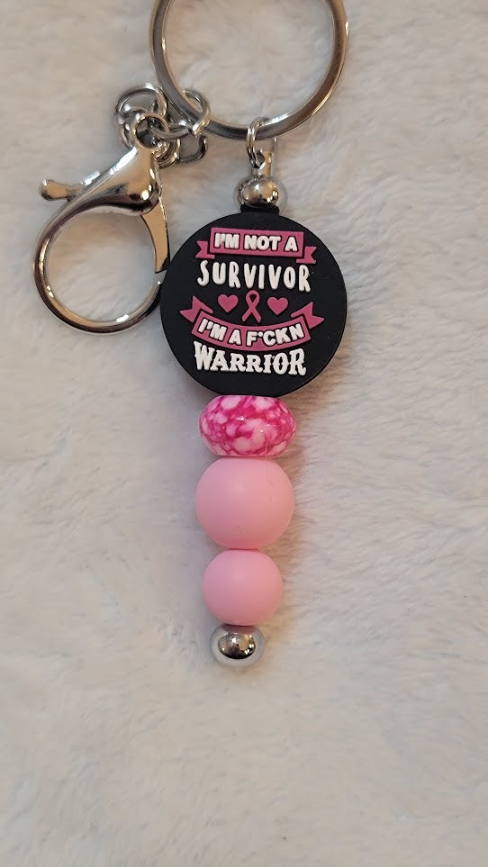 'I'm not a survivor" bar keychain