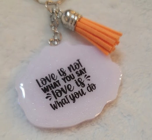 "Love is not what you say" Key Chain