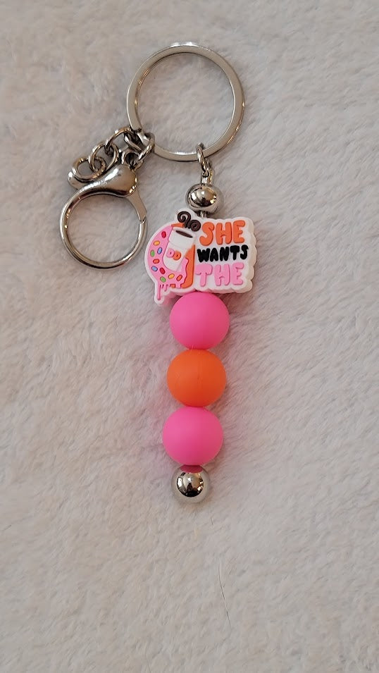 "She wants the - Dunkin" bar keychain