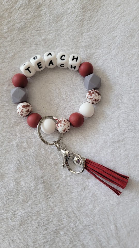 "Teach" wristlet - 3 options